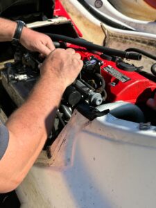 Technician working on motor wiring